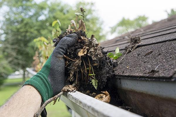 for gutter cleaning, we use specialized tools such as hand scoops and gutter flushers