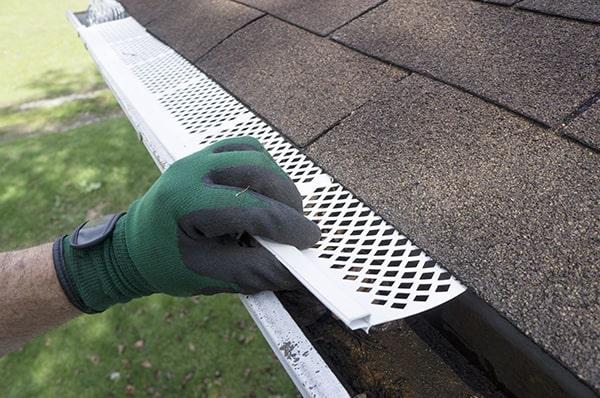 gutter guards can help prevent the accumulation of debris and water in your gutters, reducing the risk of ice dams forming